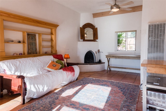 living room featuring tile patterned flooring and ceiling fan