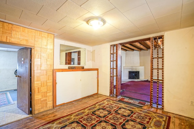 interior space featuring a tile fireplace