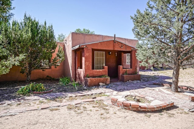 view of front of home featuring a patio area