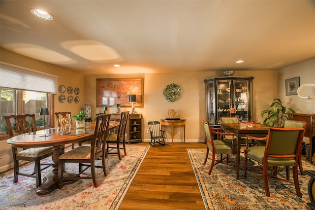 dining room with dark hardwood / wood-style floors