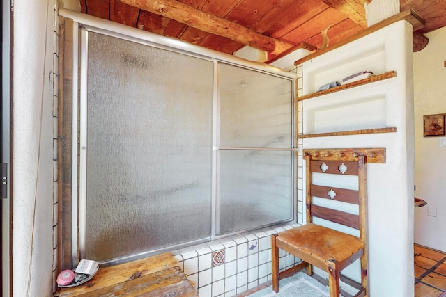 bathroom with beam ceiling and wooden ceiling