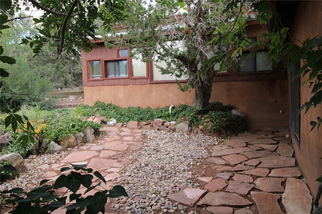 view of property exterior featuring a patio