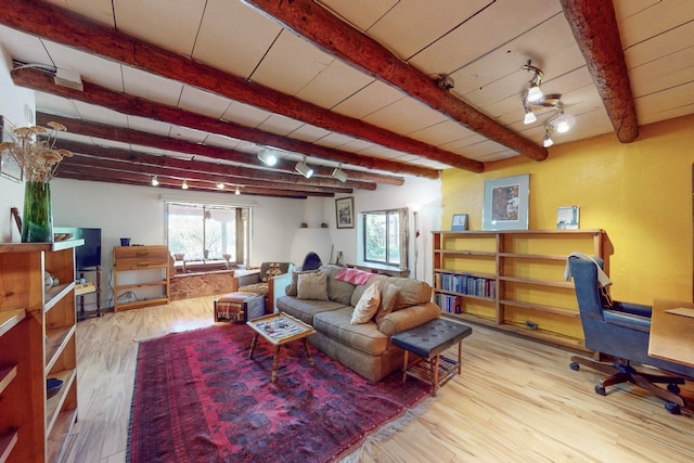 living room with wooden ceiling, beam ceiling, and light hardwood / wood-style flooring