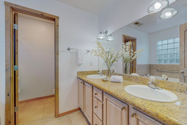 bathroom featuring vanity and tile patterned flooring