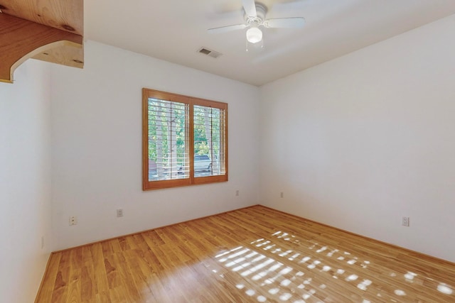 unfurnished room with light hardwood / wood-style flooring and ceiling fan