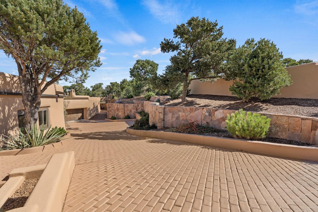 view of patio / terrace featuring fence