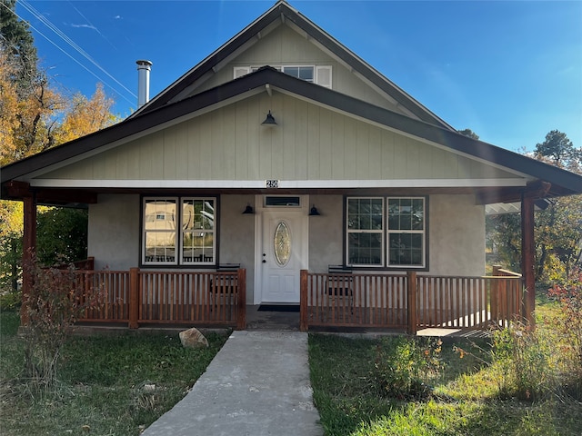 bungalow featuring a porch