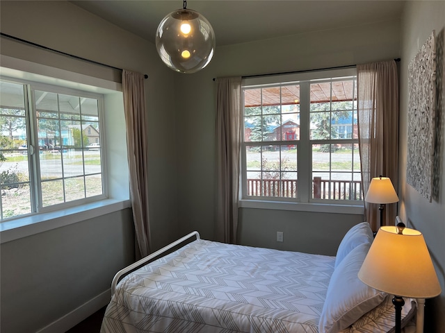 bedroom with multiple windows