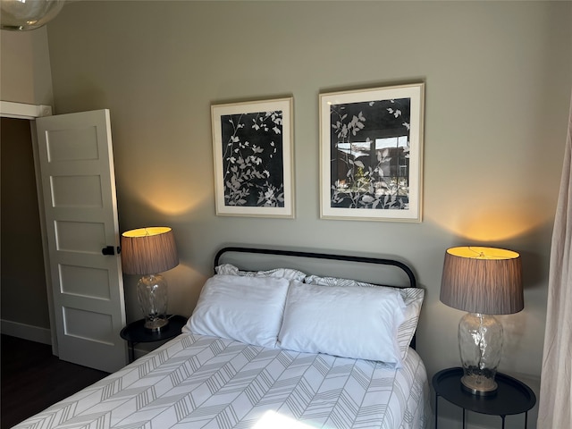 bedroom featuring dark wood-type flooring