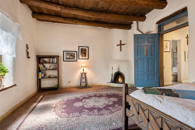 living room with beamed ceiling and wood ceiling