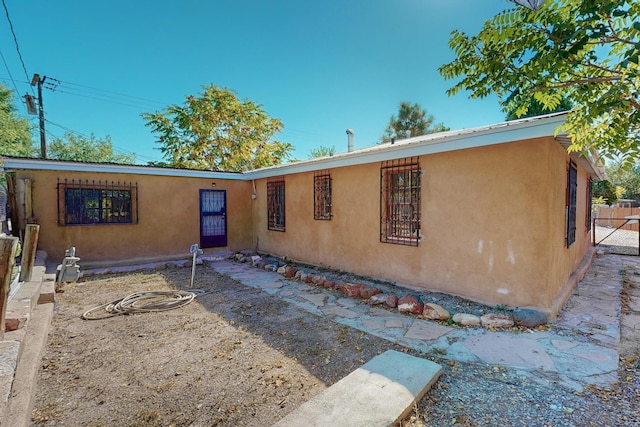 view of front facade with a patio area