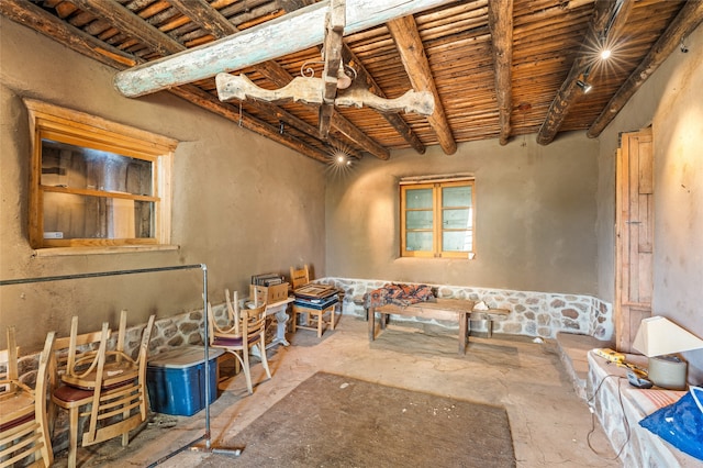 miscellaneous room featuring beam ceiling and wood ceiling