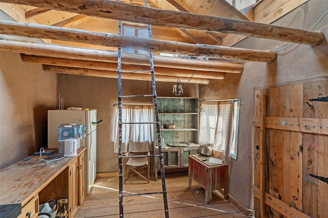 basement with wood-type flooring and wood ceiling