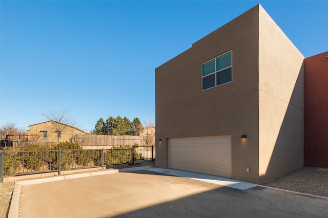 view of home's exterior with a garage