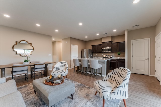 living room with light wood-type flooring