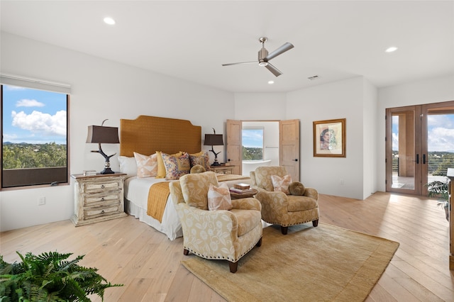 bedroom featuring french doors, access to outside, ceiling fan, and light hardwood / wood-style floors