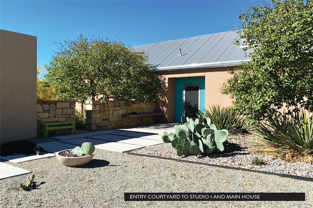 rear view of property with a patio