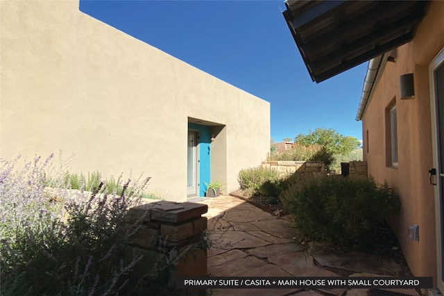 view of home's exterior with a patio