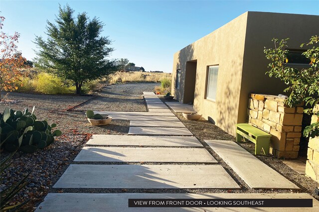 view of property exterior with a patio