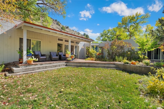 view of yard featuring a patio and an outdoor hangout area