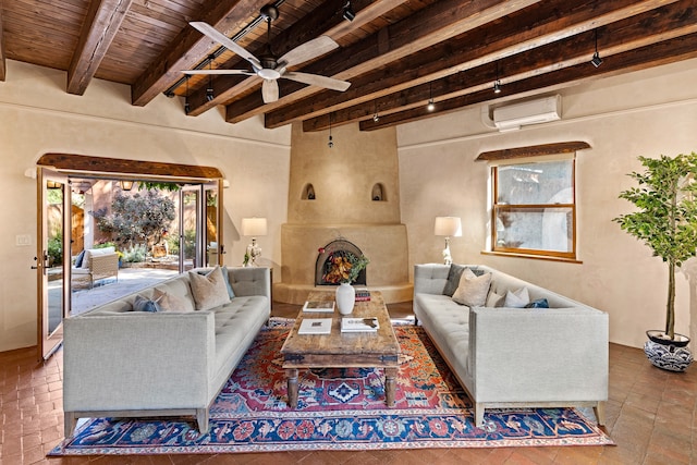 living room featuring a wall unit AC, beamed ceiling, wood ceiling, and ceiling fan