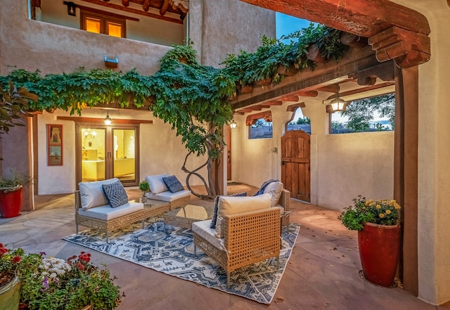 view of patio with french doors and an outdoor living space