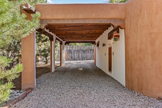 view of patio featuring a carport