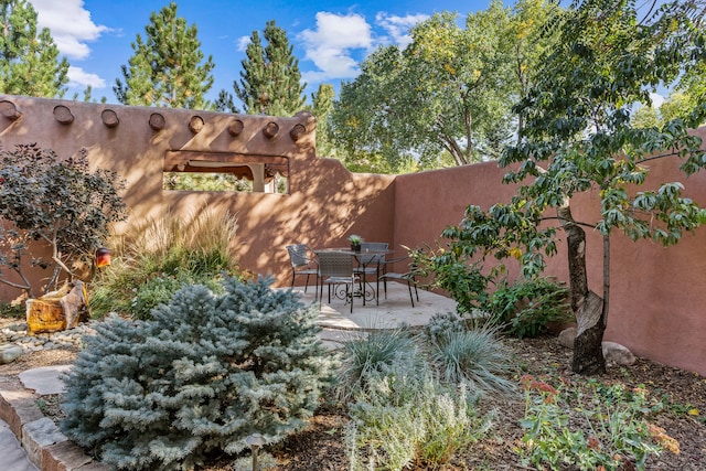 view of patio / terrace featuring a pergola