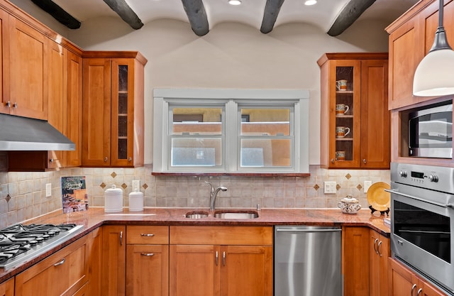 kitchen with beamed ceiling, sink, backsplash, and stainless steel appliances