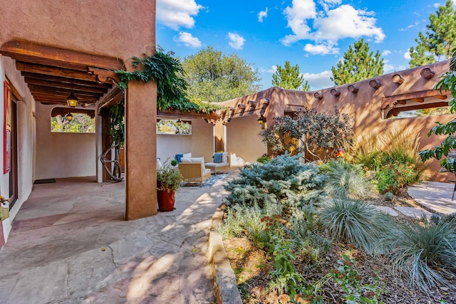 view of patio with an outdoor hangout area