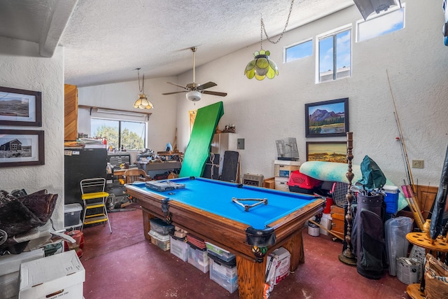 game room with ceiling fan, vaulted ceiling, billiards, and a textured ceiling