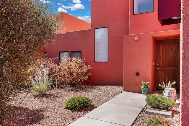 southwest-style home with a garage