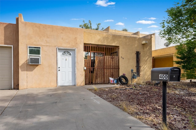 view of exterior entry featuring a garage