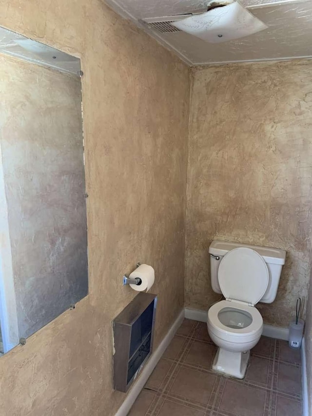 bathroom featuring toilet