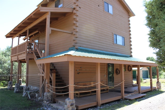 exterior space featuring a wooden deck