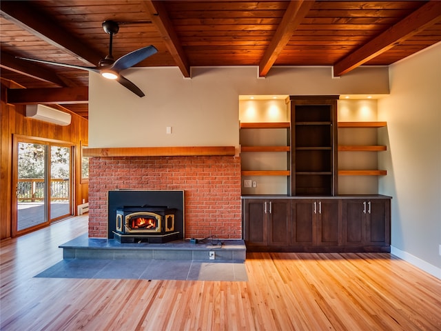 unfurnished living room featuring a wall mounted air conditioner, wood ceiling, and light wood-type flooring