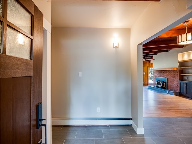 hall featuring dark hardwood / wood-style floors and baseboard heating