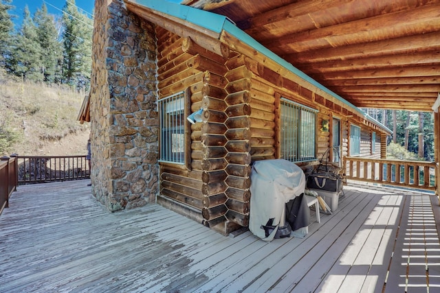 12 Pine Ln, Terrero, NM 87573 - wooden terrace with a grill
