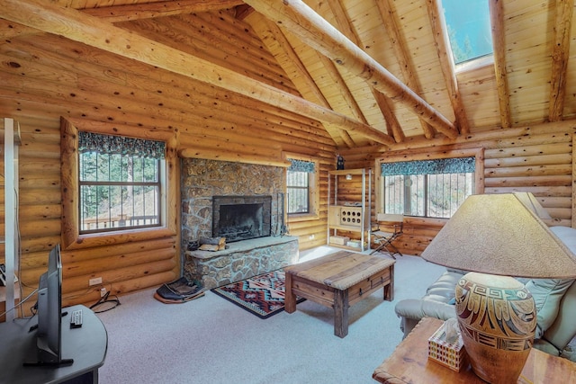 living room featuring beamed ceiling, rustic walls, a healthy amount of sunlight, and a skylight