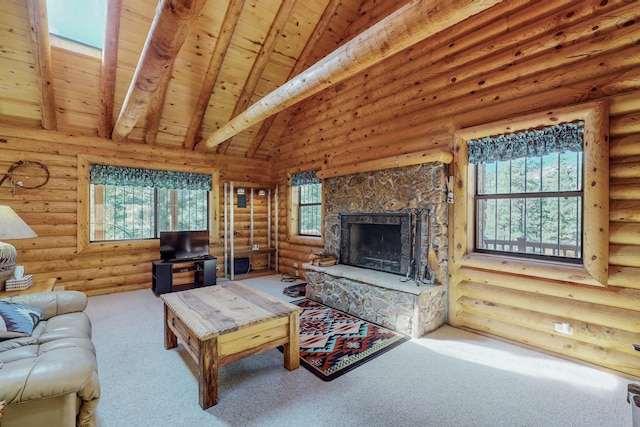 12 Pine Ln, Terrero, NM 87573 - living area with wood ceiling with exposed beams, a fireplace, carpet flooring, high vaulted ceiling, and log walls