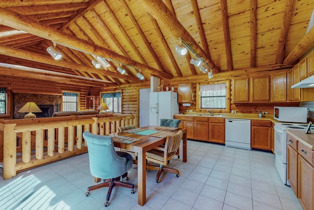 tiled dining room featuring wooden ceiling, sink, and vaulted ceiling with beams