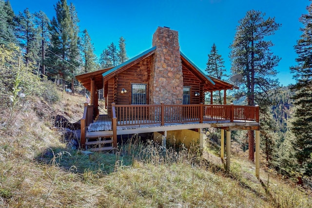 rear view of house with a deck