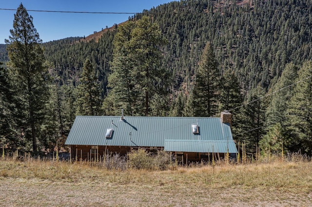 12 Pine Ln, Terrero, NM 87573 - view of mountain backdrop with a forest