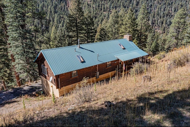 12 Pine Ln, Terrero, NM 87573 - view of subject property with a heavily wooded area