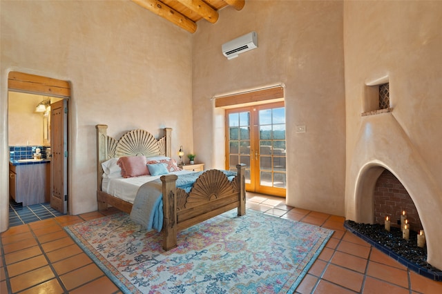 bedroom featuring tile patterned flooring, beam ceiling, french doors, wooden ceiling, and an AC wall unit