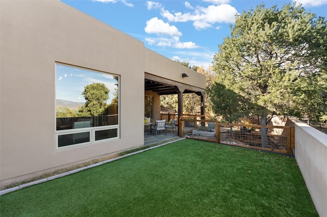 view of yard with a patio area