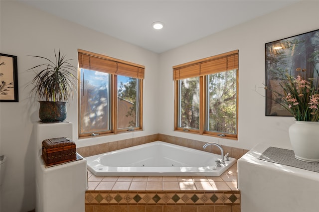 bathroom featuring tiled bath