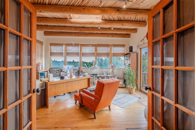 office space with french doors, beamed ceiling, wood ceiling, and light hardwood / wood-style floors