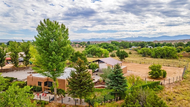 aerial view with a mountain view and a rural view