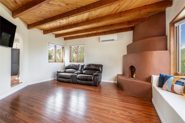 living room featuring beam ceiling, a wall mounted AC, wooden ceiling, and wood-type flooring